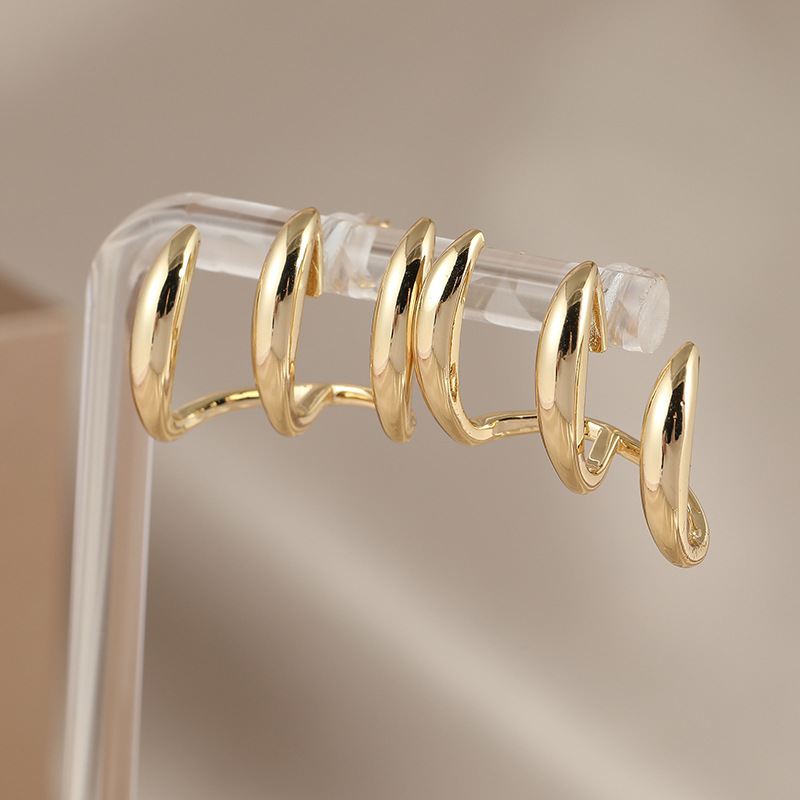 Elegant Gold Tone Triple Curve Hoop Earrings for Every Occasion